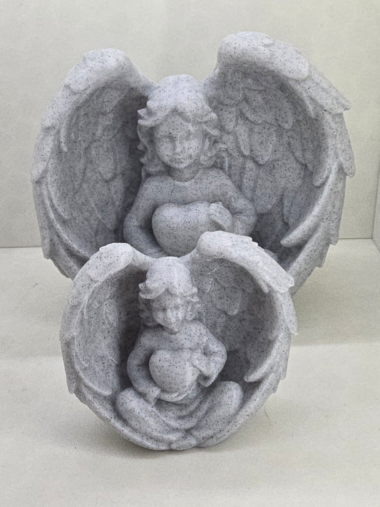 Angel with wings holding Heart Statue Small