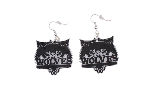 3D printed White Cliffs Wolves earrings in black and white with a wolf head and paw print design.