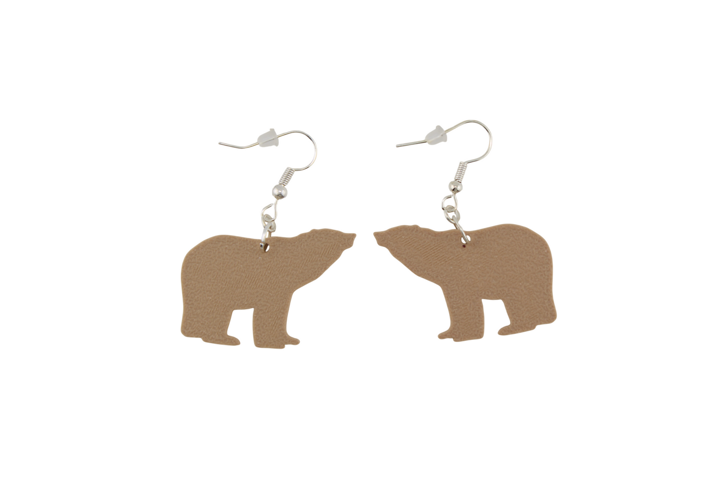 A pair of tan 3D printed bear silhouette dangle earrings with silver hypoallergenic hooks.