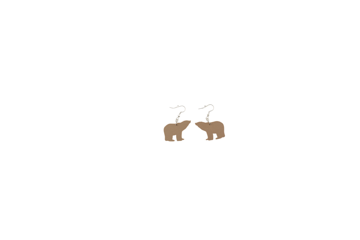 A pair of tan 3D printed bear silhouette dangle earrings with silver hypoallergenic hooks.