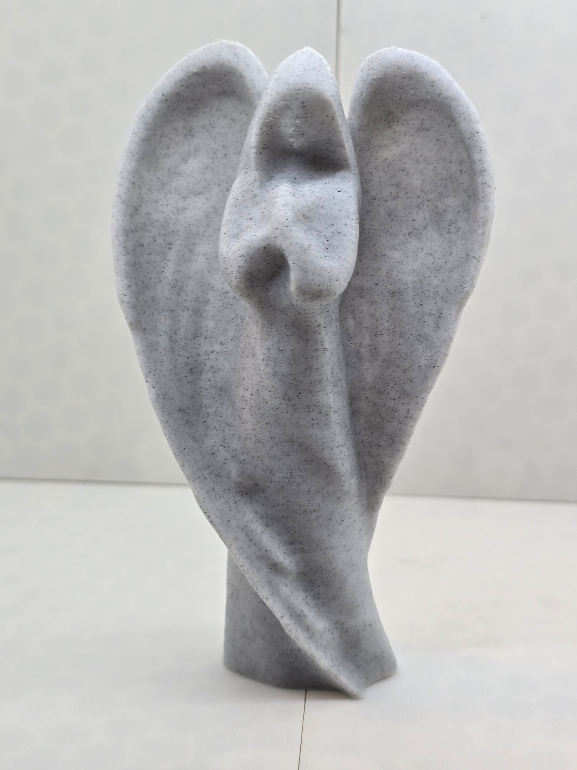 3D printed angel praying statue in a marble-textured finish.