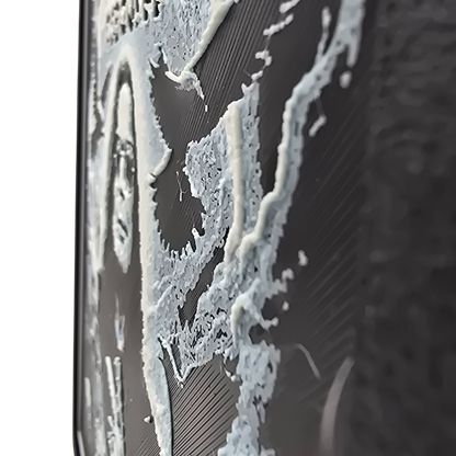 Framed memorial painting for Ozzy Osbourne with crows, skulls, and cross symbols and birth and death years on a black background.