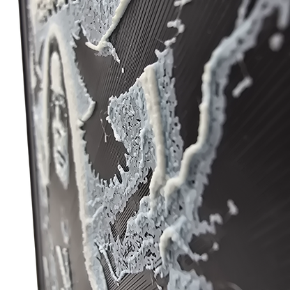 Close up side view of Framed memorial painting for Ozzy Osbourne with crows, skulls, and cross symbols and birth and death years on a black background.