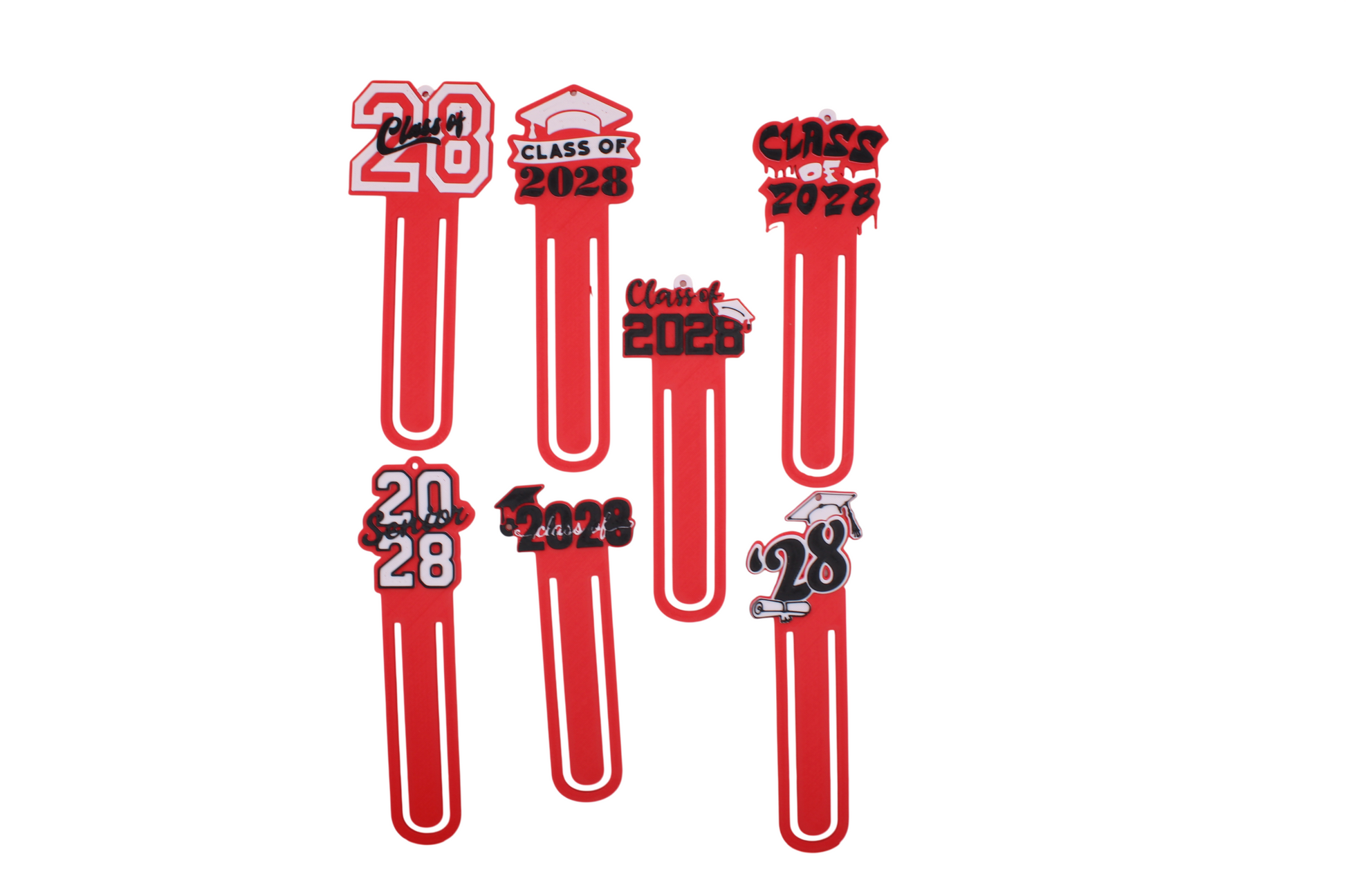 Seven red 3D printed Class of 2028 graduation bookmarks in various styles with page clip bodies.