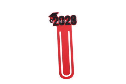 3D printed red graduation bookmark with black and white Class of 2028 lettering and cap icons