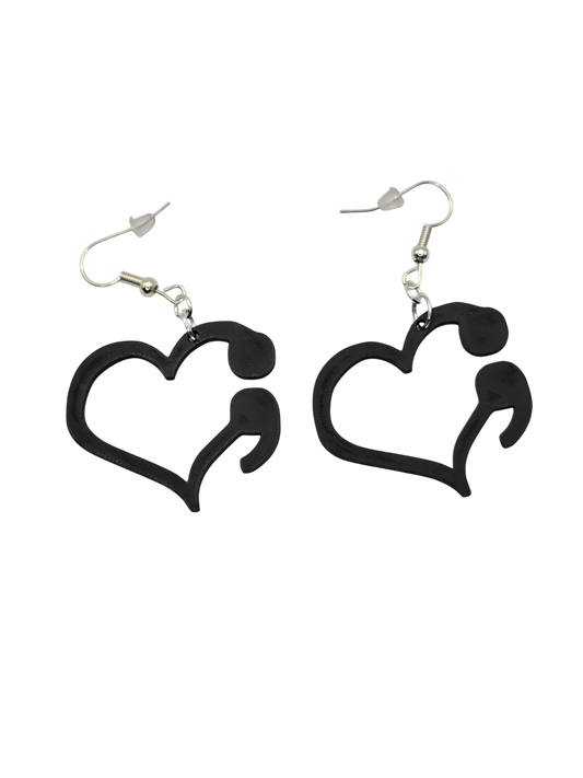 Black heart-shaped earrings with no background