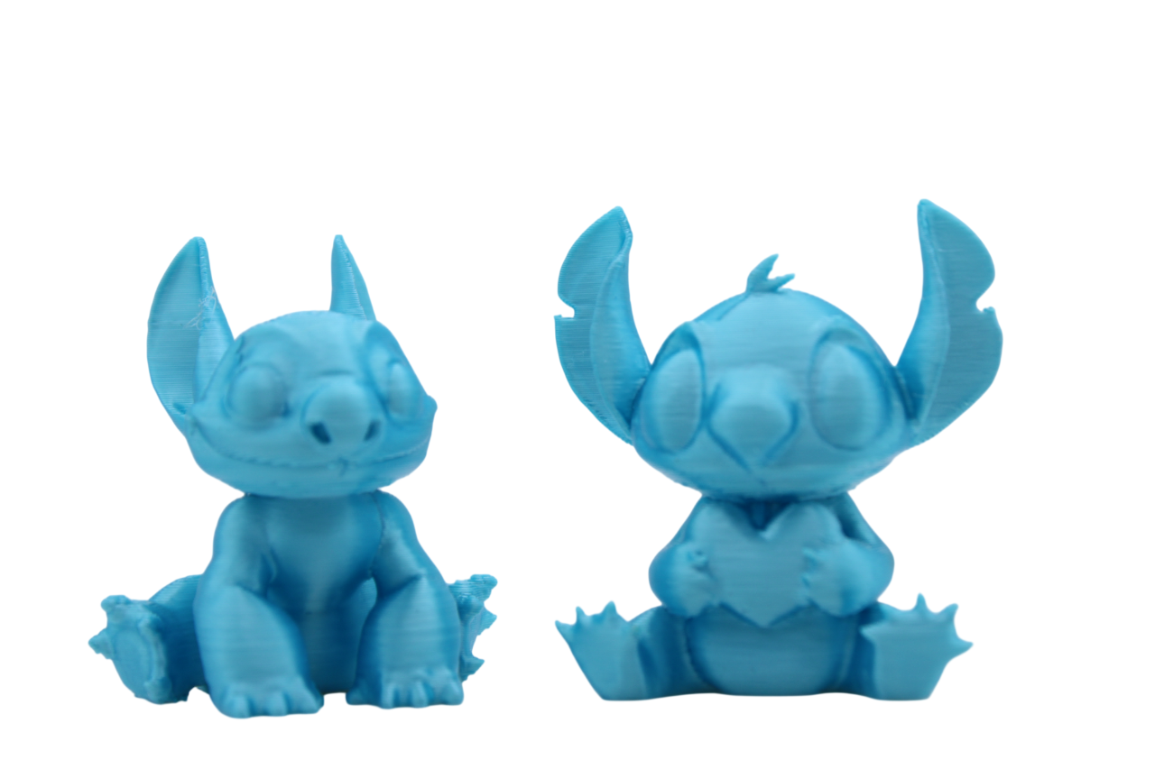 Stitch and Stitch Holding Heart Statues