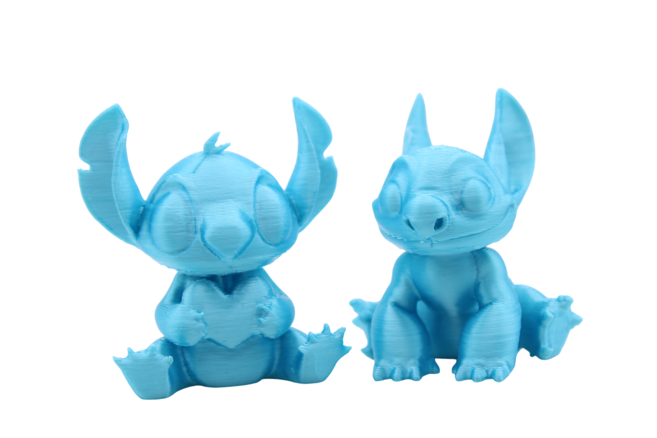 Stitch and Stitch Holding Heart Statues