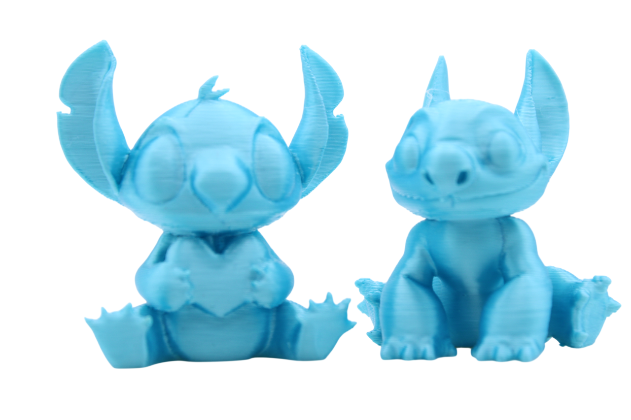 Stitch and Stitch Holding Heart Statues