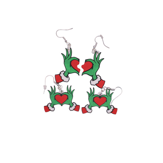 2 Pairs of earrings with green hands holding red hearts on a white background