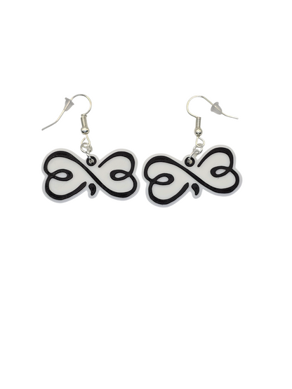 Black and white earrings on a white background