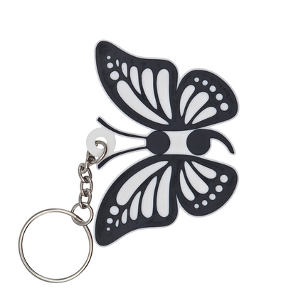 Butterfly-shaped keychain on a white background