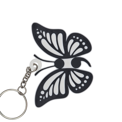 Butterfly-shaped keychain on a white background
