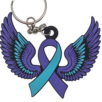 Keychain with teal and purple wings and a teal and purple ribbon on a white background
