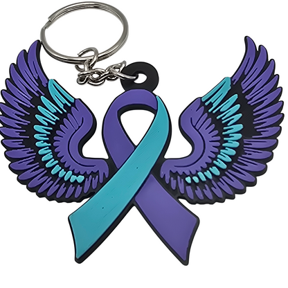 Keychain with teal and purple wings and a teal and purple ribbon on a white background