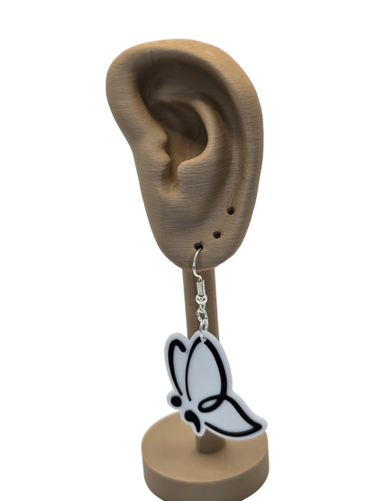 Butterfly-shaped earring on a 3d printed ear model