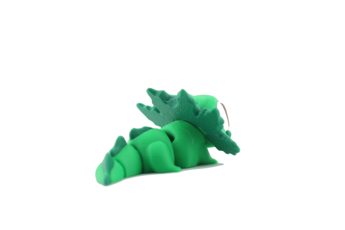 Rear three-quarter view of the 3D printed green axolotl flexi showing the back of its gills and wiggly segmented body
