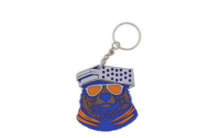 Single 3D printed Chicago Bears bear head keychain with metal ring — blue bear sporting orange sunglasses and a cheese grater cap.