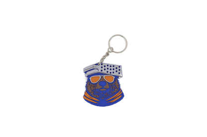 Side view of 3D printed Chicago Bears bear head keychain showing the layered blue, brown, and orange 3D print detail.