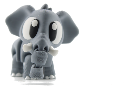Front view of the 3D printed flexi baby elephant standing tall, gray body, wide ears, white tusks and trunk hanging down