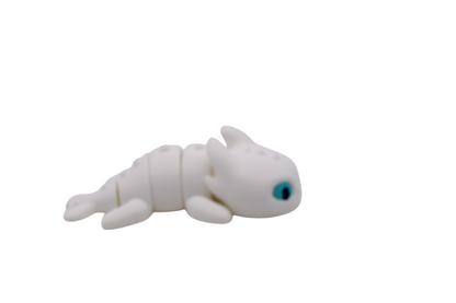 Small light fury dragon from how to train your dragon