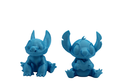Stitch and Stitch Holding Heart Statues