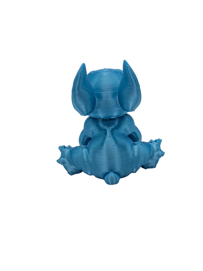 Stitch and Stitch Holding Heart Statues