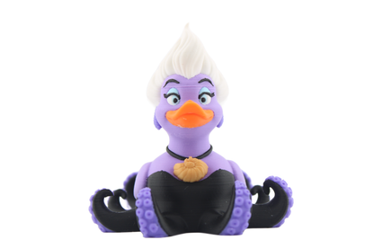 3D printed Ursula duck figurine front view with swept-up white hair, lavender body, orange bill, gold shell necklace and black tentacle base with purple suckers, by Erratically Eccentric Creations