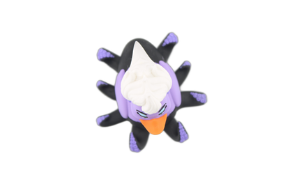 Top-down view of the 3D printed Ursula duck showing her white hair, orange bill and black tentacles with purple tips spread around her